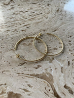 Load image into Gallery viewer, big Swirl hoops gold
